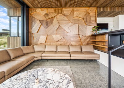 Sunken lounge, feature lounge, feature wall paneling, polished concrete